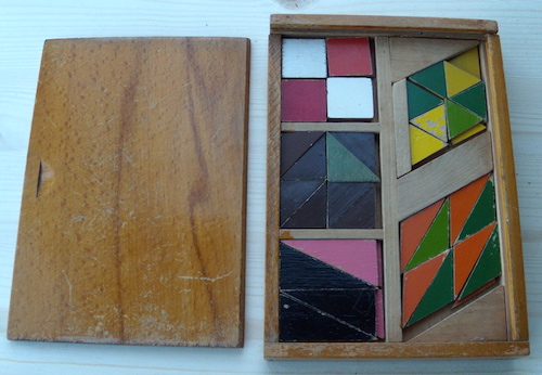Houten Tangram-achtige Puzzels